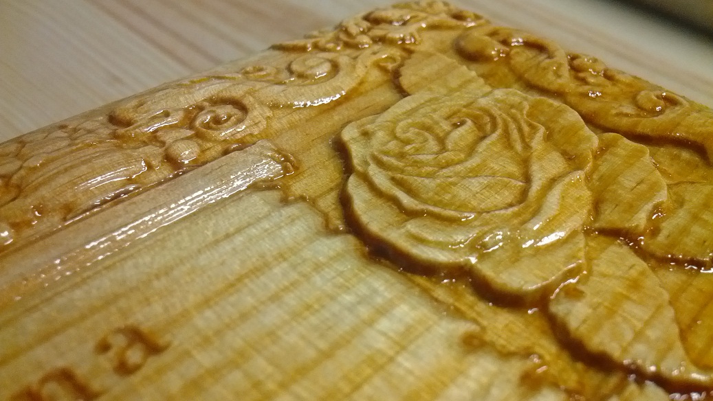 Detail — rose in relief